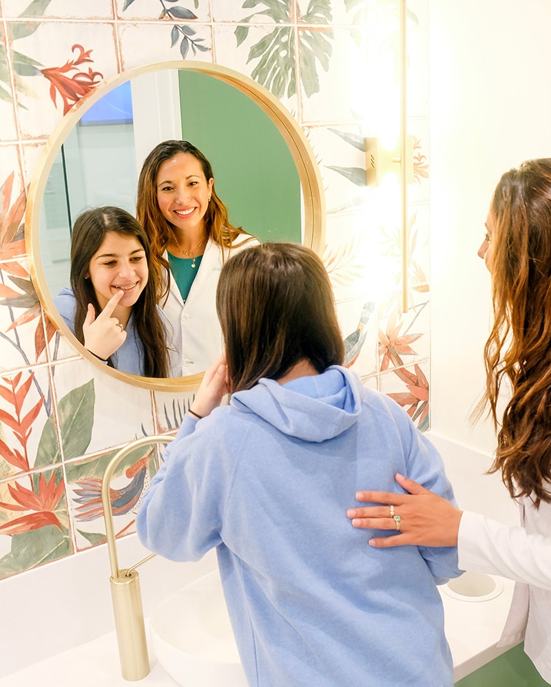 Dr. Zoey and a patient at Dr. Zoey Orthodontics in Vero Beach, FL